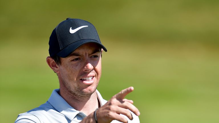 Rory McIlroy of Northern Ireland points during a practice round prior to the 146th Open Championship at Royal Birkdale