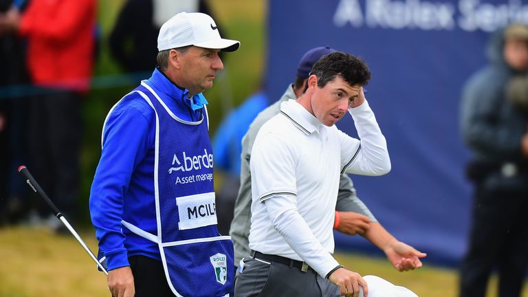 TROON, SCOTLAND - JULY 14:  A dejected Rory McIlroy of Northern Ireland leaves the 18th green after finishing his second round during Day Two of the AAM Sc