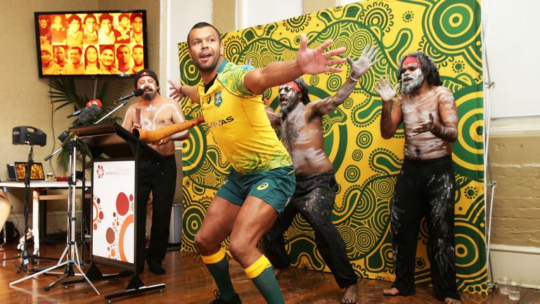 Kurtley Beale dances with performers during the Wallabies Indigenous Jersey Launch at the National Centre of Indigenous Excellence in Sydney, Australia