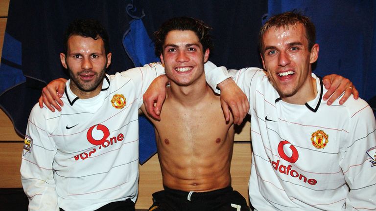 Ryan Giggs, Cristiano Ronaldo and Phil Neville celebrate in the dressing room after winning the AXA FA Cup match between Manchester United and Arsenal