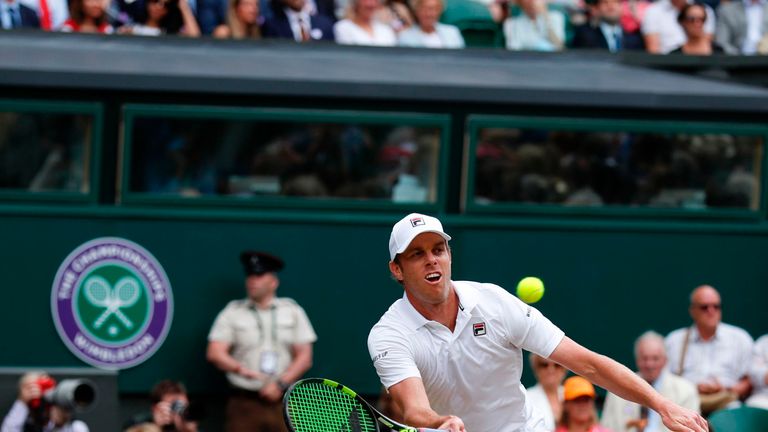 US player Sam Querrey returns against Croatia's Marin Cilic during their men's singles semi-final match on the eleventh day of the 2017 Wimbledon Champions