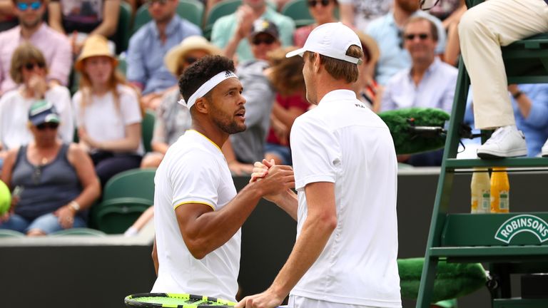 LONDON, ENGLAND - JULY 08:  Sam Querrey of The United States and Jo-Wilfried Tsonga of France shake hands after their Gentlemen's Singles third round match