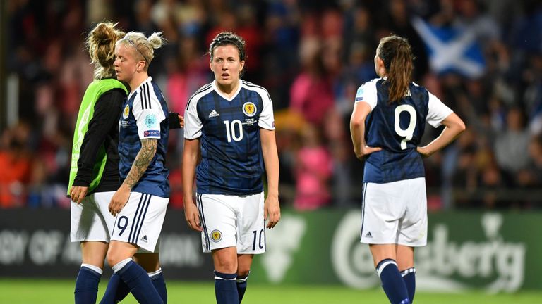 Scotland's midfielder Leanne Crichton (C) and teammates react after winning the UEFA Women's Euro 2017 football match against Spain but failing to qualify 