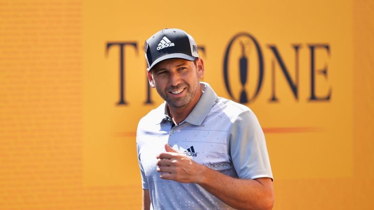 Sergio Garcia of Spain walks onto the 1st tee during the third round of The 146th Open