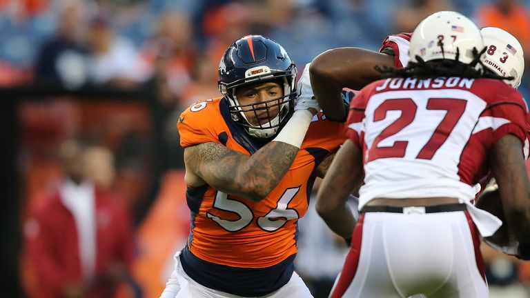 DENVER, CO - SEPTEMBER 03:  Shane Ray #56 of the Denver Broncos battles on the line of scrimmage as he pursues Chris Johnson #27 of the Arizona Cardinals d