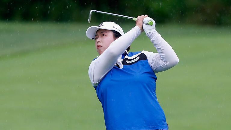 BEDMINSTER, NJ - JULY 14:  Shanshan Feng of China watches her second shot on the second hole during the second round of the U.S. Women's Open Championship 