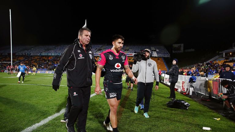 Shaun Johnson of the New Zealand Warriors walks off the field after picking up an injury