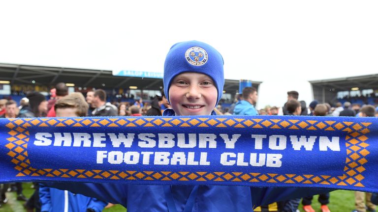 A Shrewsbury Town fan shows his support during the Sky Bet League Two match at Greenhous Meadow, Shrewsbury.