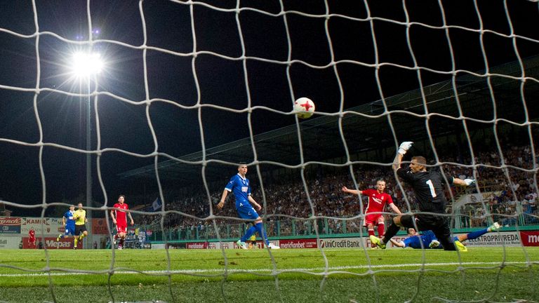 Gary Mackay-Steven (3rd right) scores the second goal in Bosnia