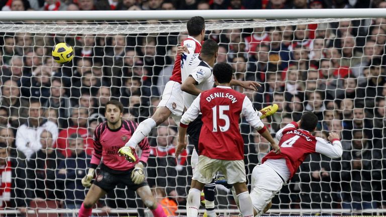 Tottenham Hotspur's French defender Younes Kaboul (3rd R) scores Tottenham's late winning goal  during the English Premier League football match between Ar