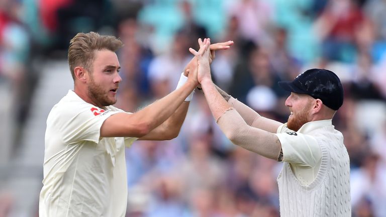England's Stuart Broad (left) celebrates with Ben Stokes after taking the wicket of Heino Kuhn