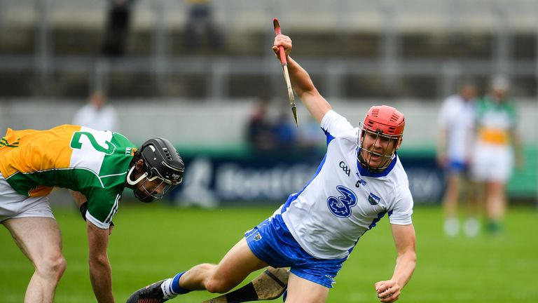 Tadhg de Burca of Waterford is fouled by Ben Conneely of Offaly during the GAA Hurling All-Ireland Senior Championship Round 1 match