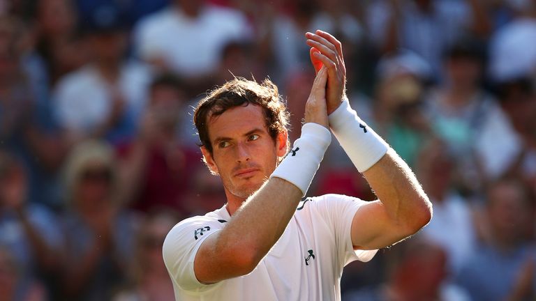 Andy Murray of Great acknowledges the crowd as he celebrates victory after his second round match at Wimbledon