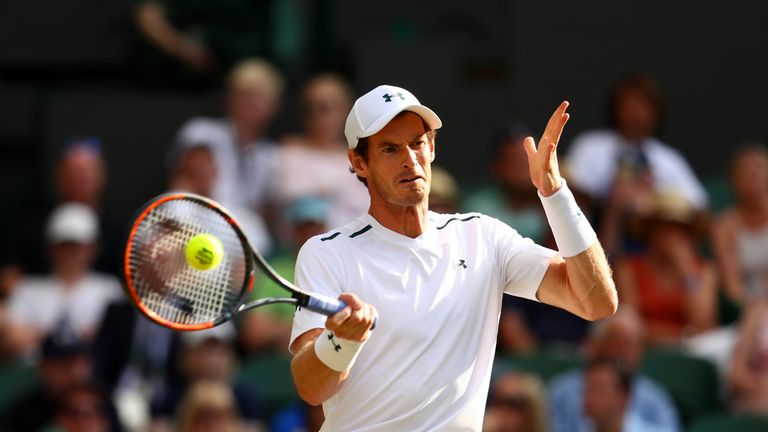 Andy Murray of Great Britain plays a forehand during the Gentlemen's Singles third round match against Fabio Fognini