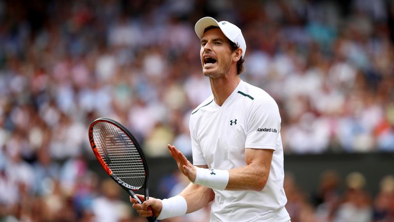 Andy Murray of Great Britain reacts during the Gentlemen's Singles fourth round match against Benoit Paire of France