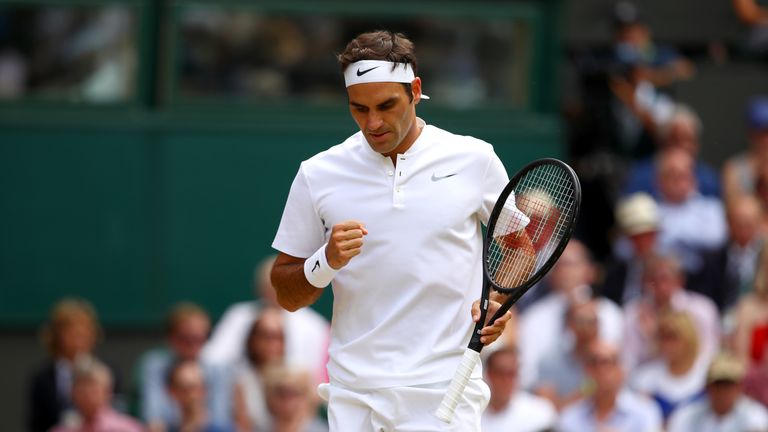 Roger Federer of Switzerland celebrates during the Gentlemen's Singles final against  Marin Cilic of Croatia