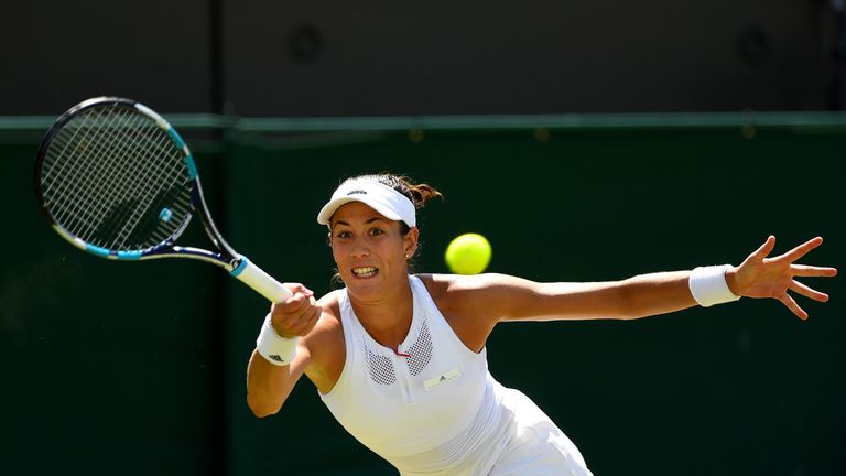 Garbine Muguruza plays a forehand during fourth round simgles match against Angelique Kerber