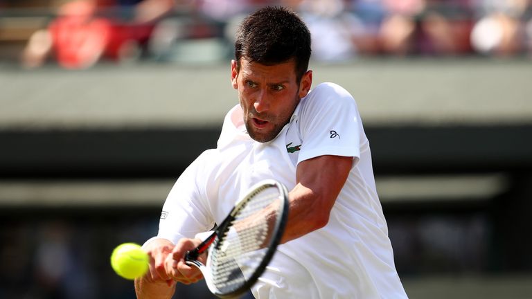 Novak Djokovic plays a backhand during his second round match against Adam Pavlasek
