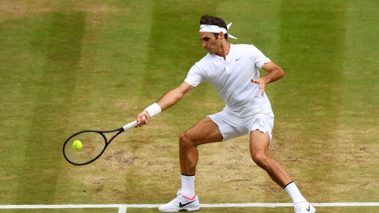 Roger Federer of Switzerland plays a forehand during the Gentlemen's Singles final against  Marin Cilic of Croatia