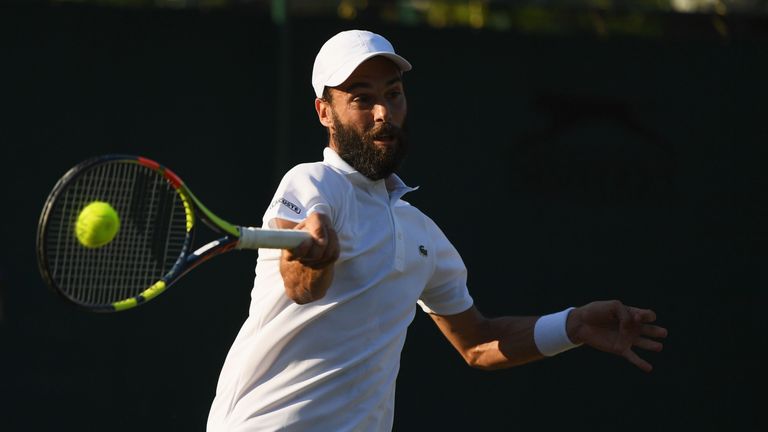 Benoit Paire of France plays a forehand during the Gentlemen's Singles second round match against Pierre-Hugues Herbert