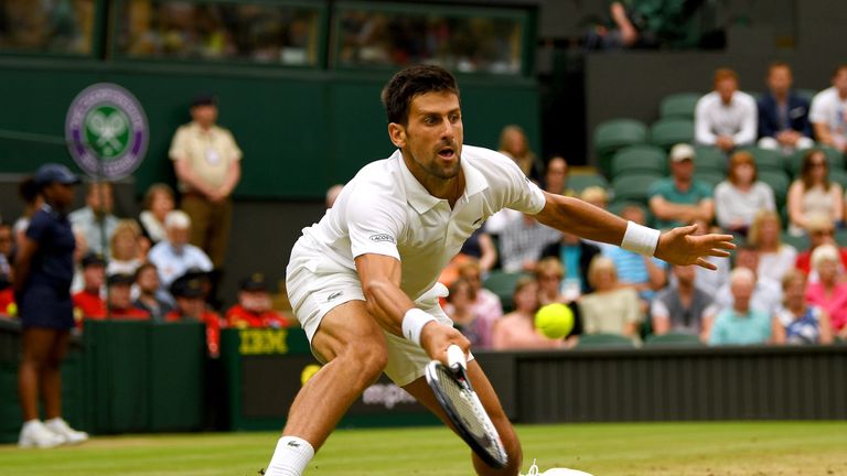 Novak Djokovic of Serbia plays a forehand during the Gentlemen's Singles fourth round match against Adrian Mannarino of France 