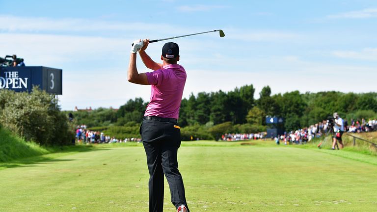 Ian Poulter of England hits his tee shot on the 4th hole during the third round of The 146th Open
