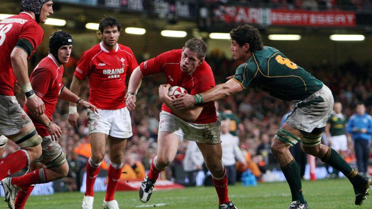 Wales' Rhys Thomas steps inside South Africa's Ryan Kankowski during the Prince William Cup match at the Millennium Stadium, Cardiff.