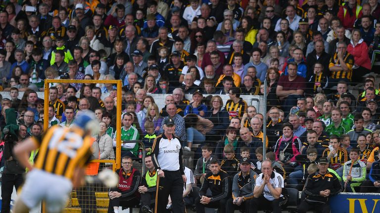 Kilkenny manager Brian Cody looks on as T J Reid takes a free during the GAA Hurling All-Ireland Senior Championship Round 1 match