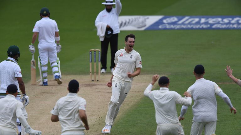 Toby Roland-Jones of England celebrates after taking the wicket of Vernon Philander of South Africa during day five of the 3rd 