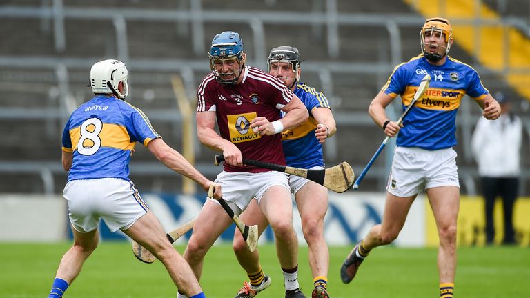 Tommy Doyle of Westmeath is blocked down by Brendan Maher, left, Dan McCormack, and Seamus Callanan of Tipperary