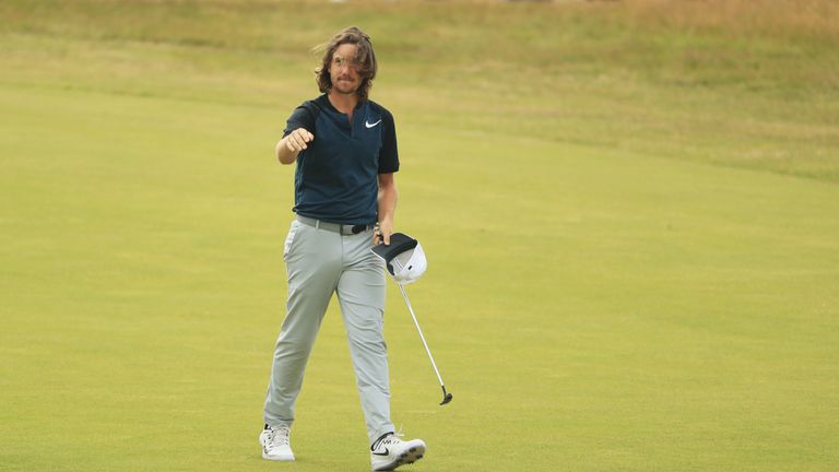 Tommy Fleetwood of England waves to the galleries on the 18th fairway during the final round of The 146th Open 