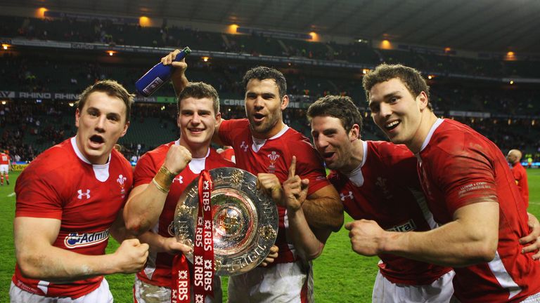 LONDON, ENGLAND - FEBRUARY 25:  (L-R) Jonathan Davies, Scott Williams, Mike Phillips, Alex Cuthbert and George North of Wales celebrate with the Triple Cro