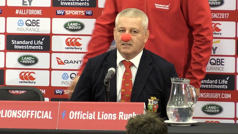 British and Irish Lions coach Warren Gatland wore a red nose during a press conference after the third Test in Auckland