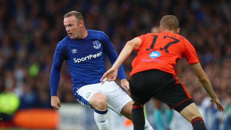 LIVERPOOL, ENGLAND - JULY 27: Wayne Rooney of Everton in action with Peter Maslo of  MFK Ruzomberok during the UEFA Europa League Third Qualifying Round, F
