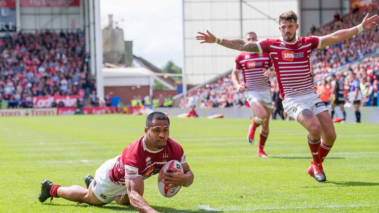 Wigan's Willie Isa goes over for a try