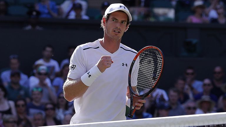 Britain's Andy Murray reacts against Germany's Dustin Brown during their men's singles second round match on the third day of 2017 Wimbledon