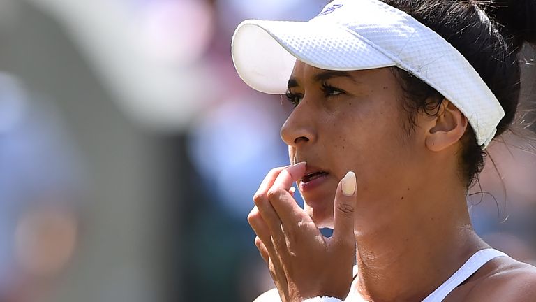 Heather Watson takes a moment during her third round match against Victoria Azarenka