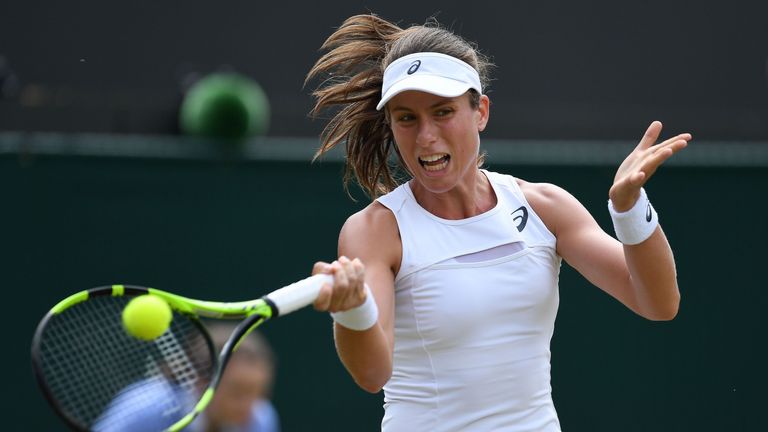 Britain's Johanna Konta returns against France's Caroline Garcia during their women's singles fourth round match on the seventh day of 2017 Wimbledon