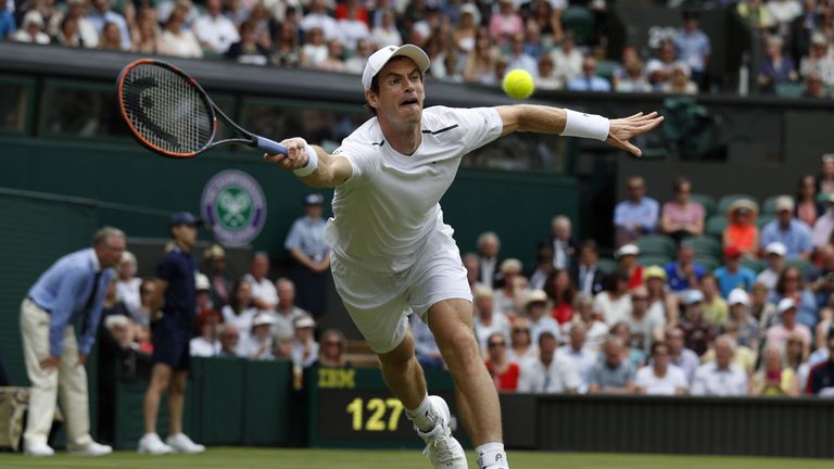 Britain's Andy Murray returns to Kazakhstan's Alexander Bublik during their men's singles first round match on the first day of the 2017 Wimbledon Champion