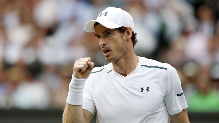 Britain's Andy Murray reacts after winning a point against France's Benoit Paire during their men's singles fourth round match