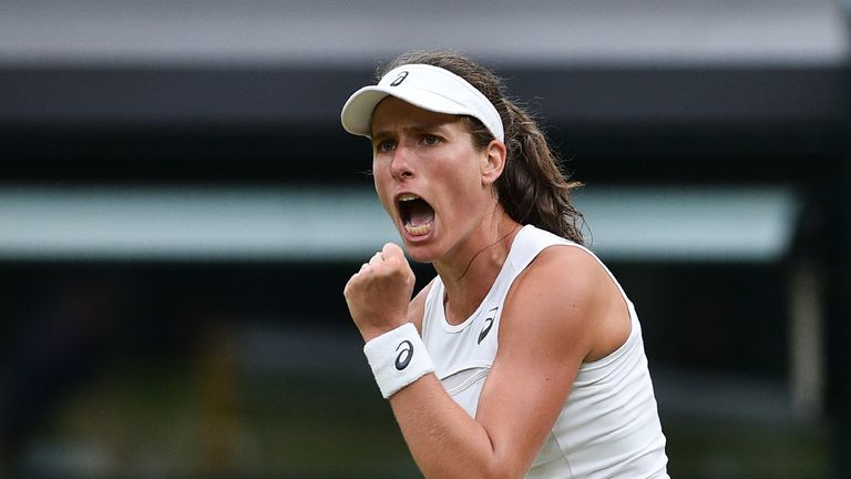Britain's Johanna Konta reacts after winning the second set tie-break against Romania's Simona Halep during their women's singles quarter-final match