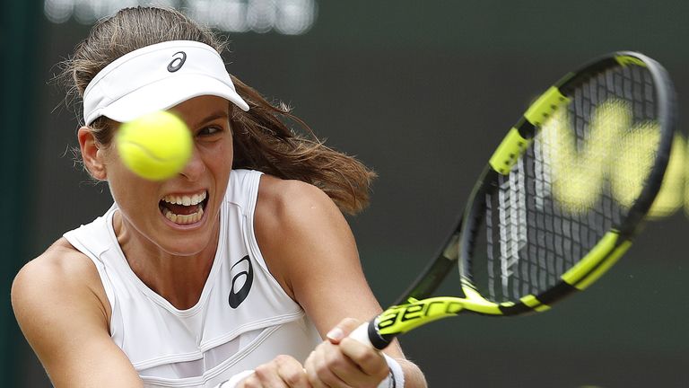 Britain's Johanna Konta returns against US player Venus Williams during their women's singles semi-final match on the tenth day of the 2017 Wimbledon
