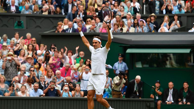 Switzerland's Roger Federer celebrates after winning against Czech Republic's Tomas Berdych during their men's singles semi-final match