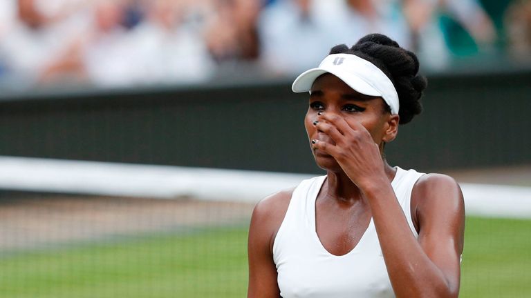 US player Venus Williams reacts against Spain's Garbine Muguruza during their women's singles final match on the twelfth day of the 2017 Wimbledon Champion