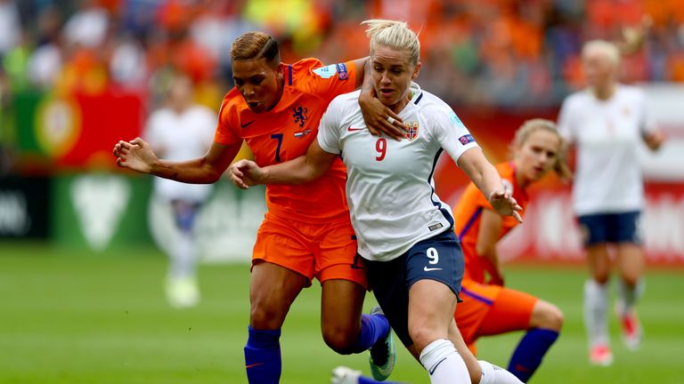 UTRECHT, NETHERLANDS - JULY 16:  Elise Thorsnes of Norway and Shanice van de Sanden of the Netherlands tackle during the Group A match between Netherlands 