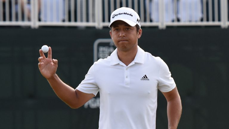 WHITE SULPHUR SPRINGS, WV - JULY 09:  Xander Schauffele reacts after his birdie putt on the 18th green to take the outright lead during the final round of 