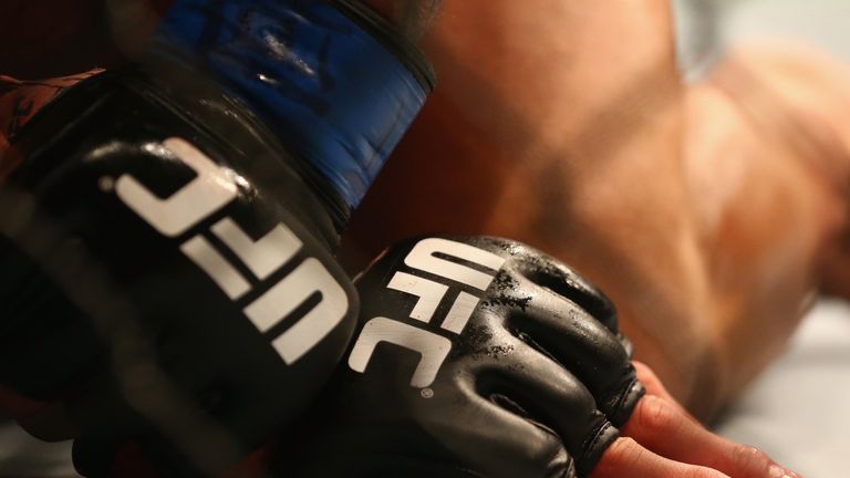 DALLAS, TX - MARCH 14:  A detail of gloves worn by Anthony Pettis and Rafael dos Anjos in the Lightweight Title bout during the UFC 185 event at American A