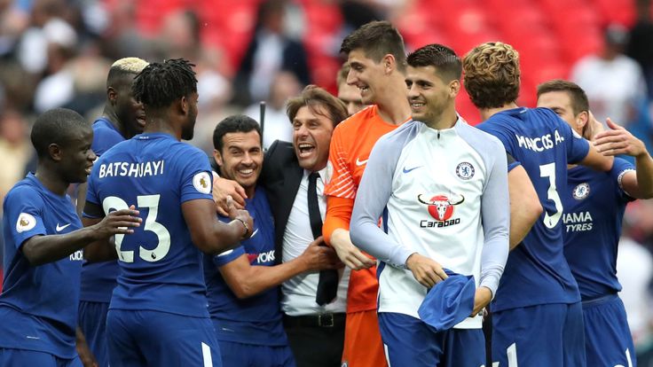 Antonio Conte, manager of Chelsea, celebrates victory with his players after the Premier League win over Tottenham Hotspur at Wembley