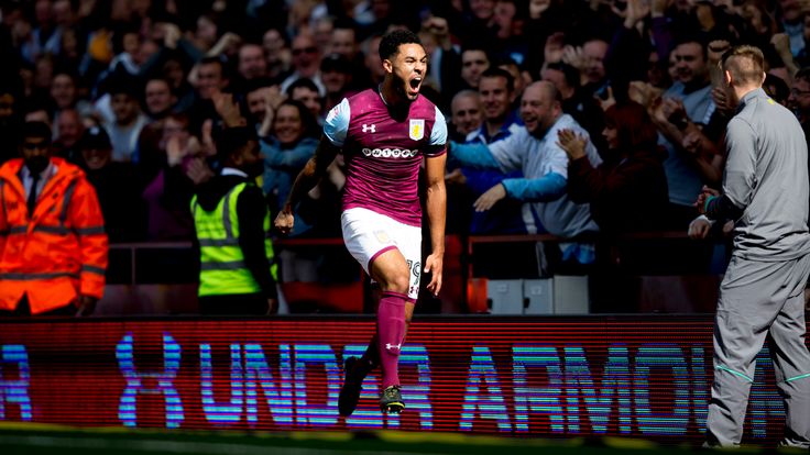 Andre Green celebrates in front of the fans after doubling Aston Villa's lead