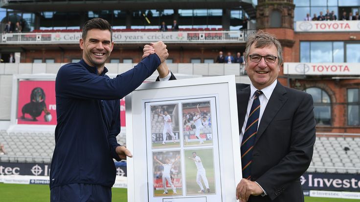 David Hodgkiss, Chairman of Lancashire CCC presents James Anderson of England with a framed photo after the naming of the James Anderson End 